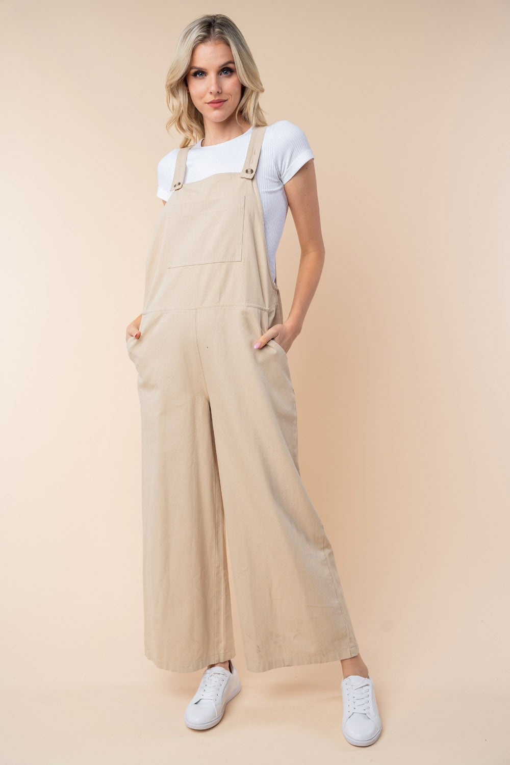 White Birch Sleeveless Wide Leg JumpsuitWhite Birch Sleeveless Wide Leg JumpsuitA Sleeveless Wide Leg Jumpsuit is a chic and versatile one-piece garment that features a sleeveless top with wide-leg pants. This style combines the comfort of a jumClothingTrendsiLive Online MallWhite Birch Sleeveless Wide Leg Jumpsuit